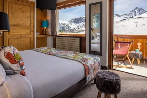 Chambre familiale sud avec balcon et vue sur les pistes